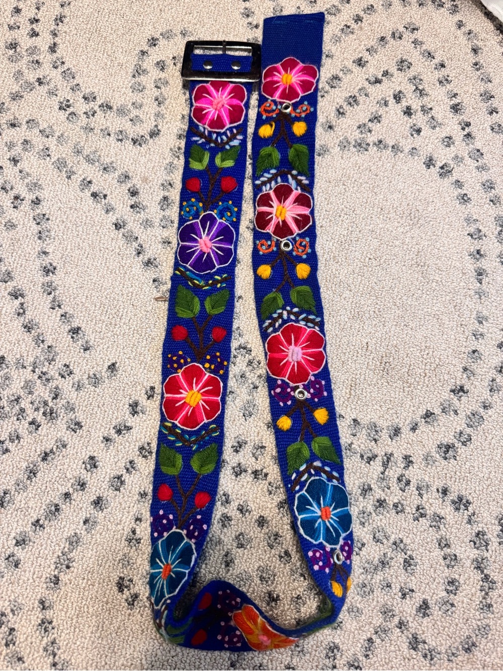 Blue Embroidered floral belt from Mexico. About 43inches. Very pretty.